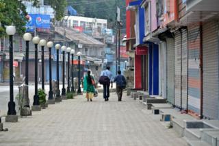 Indian tourists seen leaving the City during the curfew in Srinagar on 16 August 2019.